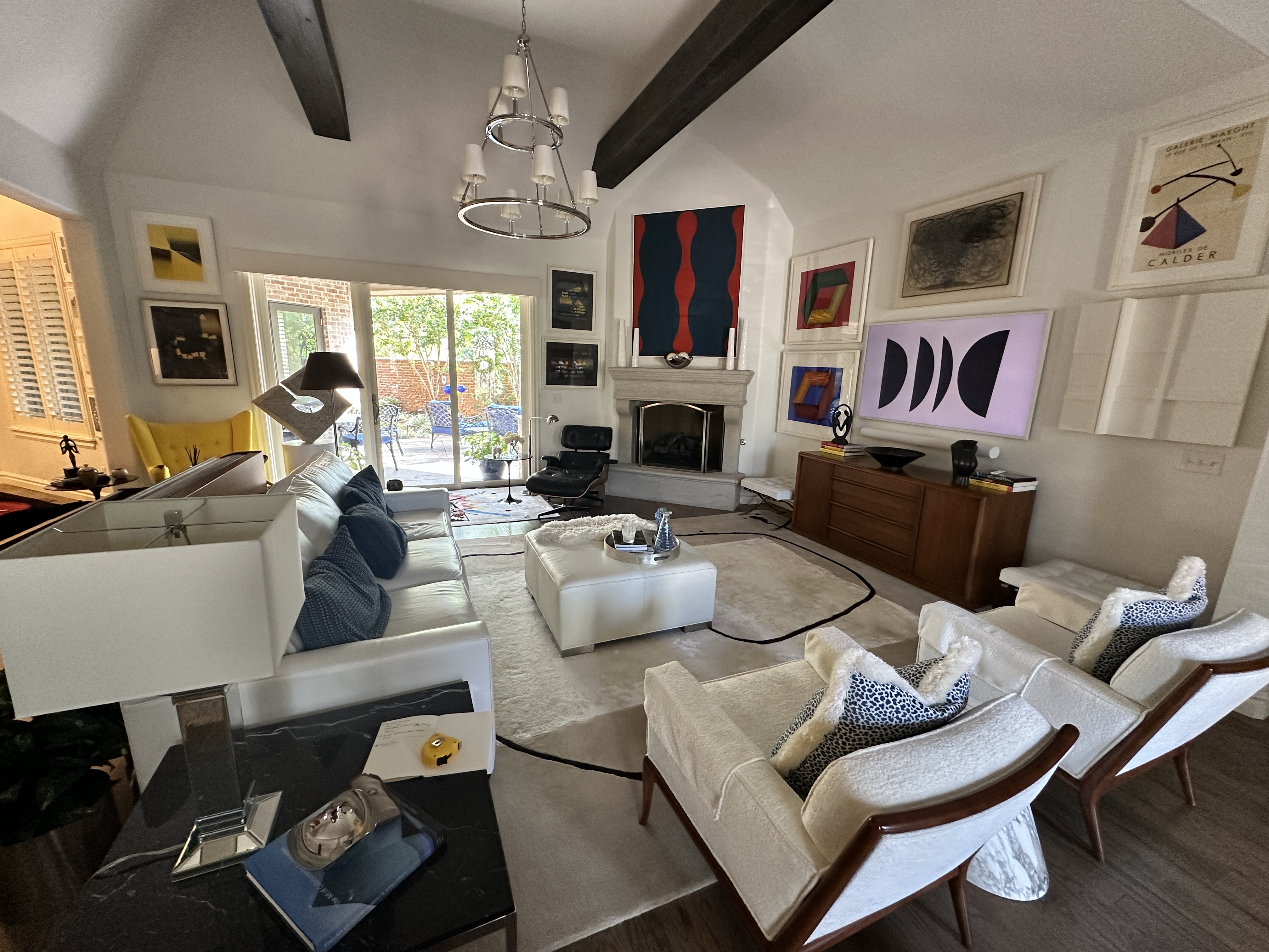 Fine art collection living room with lounge chair
